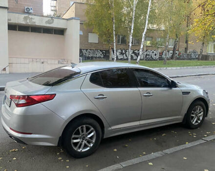 Серый Киа K5, объемом двигателя 2 л и пробегом 370 тыс. км за 8300 $, фото 1 на Automoto.ua