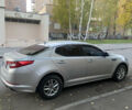 Серый Киа K5, объемом двигателя 2 л и пробегом 370 тыс. км за 8300 $, фото 1 на Automoto.ua
