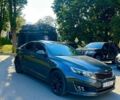 Серый Киа K5, объемом двигателя 2 л и пробегом 257 тыс. км за 9500 $, фото 1 на Automoto.ua