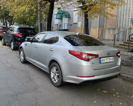 Серый Киа K5, объемом двигателя 2 л и пробегом 370 тыс. км за 8300 $, фото 2 на Automoto.ua