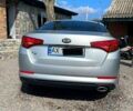 Серый Киа K5, объемом двигателя 20 л и пробегом 185 тыс. км за 9700 $, фото 6 на Automoto.ua