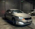 Серый Киа K5, объемом двигателя 2 л и пробегом 239 тыс. км за 8600 $, фото 1 на Automoto.ua