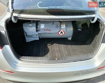 Серый Киа K5, объемом двигателя 2 л и пробегом 300 тыс. км за 8222 $, фото 10 на Automoto.ua