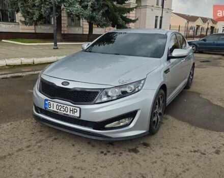 Серый Киа K5, объемом двигателя 2 л и пробегом 249 тыс. км за 8700 $, фото 6 на Automoto.ua