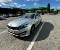 Серый Киа K5, объемом двигателя 2 л и пробегом 244 тыс. км за 7200 $, фото 1 на Automoto.ua