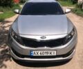 Серый Киа K5, объемом двигателя 2 л и пробегом 420 тыс. км за 7000 $, фото 1 на Automoto.ua