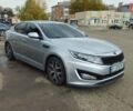 Серый Киа K5, объемом двигателя 2 л и пробегом 249 тыс. км за 8700 $, фото 1 на Automoto.ua