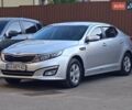 Серый Киа K5, объемом двигателя 2 л и пробегом 278 тыс. км за 8100 $, фото 1 на Automoto.ua