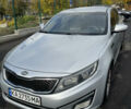 Серый Киа K5, объемом двигателя 2 л и пробегом 345 тыс. км за 8500 $, фото 1 на Automoto.ua