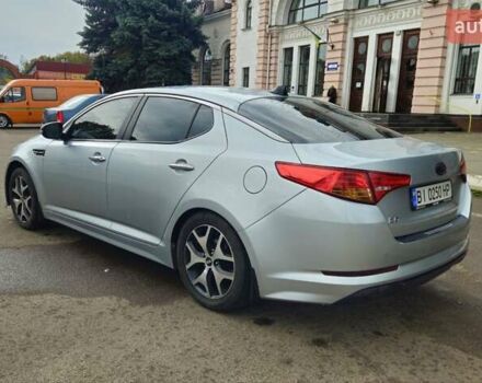Серый Киа K5, объемом двигателя 2 л и пробегом 249 тыс. км за 8700 $, фото 9 на Automoto.ua