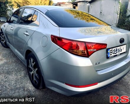 Серый Киа K5, объемом двигателя 2 л и пробегом 245 тыс. км за 7999 $, фото 5 на Automoto.ua