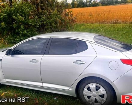 Серый Киа K5, объемом двигателя 2 л и пробегом 230 тыс. км за 12000 $, фото 3 на Automoto.ua