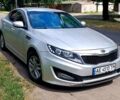 Серый Киа K5, объемом двигателя 2 л и пробегом 180 тыс. км за 8600 $, фото 3 на Automoto.ua