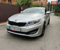 Серый Киа K5, объемом двигателя 2 л и пробегом 307 тыс. км за 8550 $, фото 1 на Automoto.ua