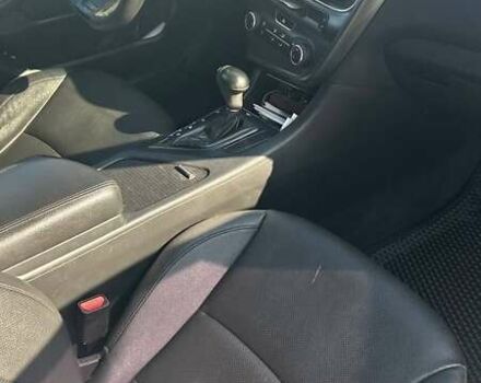 Серый Киа K5, объемом двигателя 2 л и пробегом 340 тыс. км за 8999 $, фото 13 на Automoto.ua