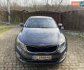 Серый Киа K5, объемом двигателя 2 л и пробегом 208 тыс. км за 10550 $, фото 1 на Automoto.ua