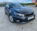 Серый Киа K5, объемом двигателя 2 л и пробегом 340 тыс. км за 9500 $, фото 1 на Automoto.ua