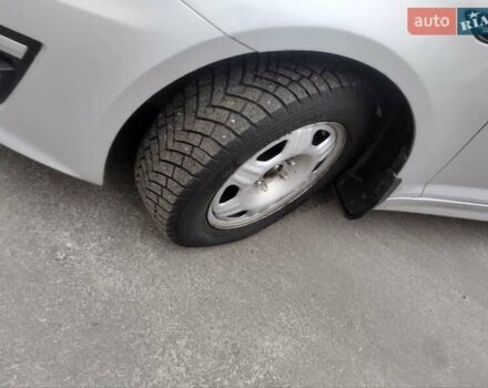 Серый Киа K5, объемом двигателя 2 л и пробегом 261 тыс. км за 6999 $, фото 7 на Automoto.ua