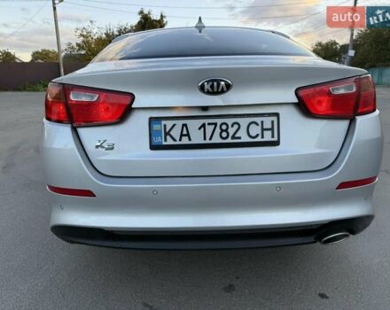 Серый Киа K5, объемом двигателя 2 л и пробегом 230 тыс. км за 7000 $, фото 1 на Automoto.ua