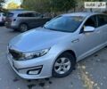 Серый Киа K5, объемом двигателя 2 л и пробегом 330 тыс. км за 9000 $, фото 1 на Automoto.ua