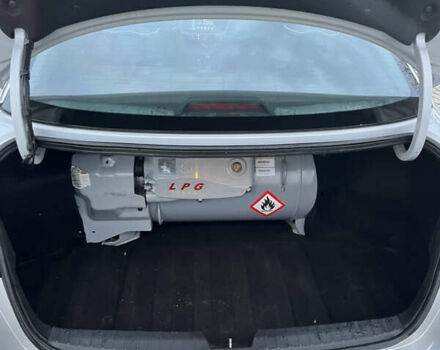 Серый Киа K5, объемом двигателя 2 л и пробегом 245 тыс. км за 9100 $, фото 3 на Automoto.ua