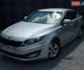 Серый Киа K5, объемом двигателя 2 л и пробегом 198 тыс. км за 6900 $, фото 1 на Automoto.ua