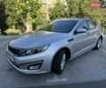 Серый Киа K5, объемом двигателя 2 л и пробегом 248 тыс. км за 9200 $, фото 1 на Automoto.ua