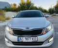 Серый Киа K5, объемом двигателя 2 л и пробегом 222 тыс. км за 10000 $, фото 2 на Automoto.ua