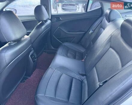 Серый Киа K5, объемом двигателя 2 л и пробегом 230 тыс. км за 7000 $, фото 6 на Automoto.ua