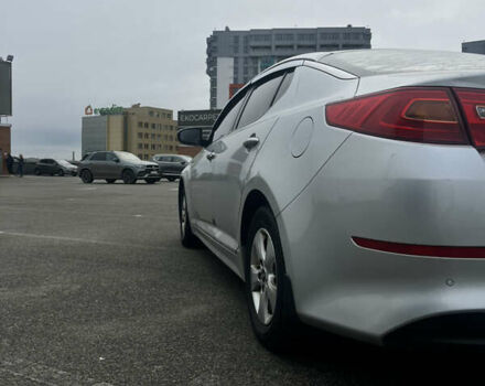 Серый Киа K5, объемом двигателя 2 л и пробегом 246 тыс. км за 7600 $, фото 5 на Automoto.ua