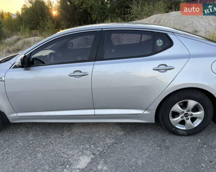 Серый Киа K5, объемом двигателя 2 л и пробегом 222 тыс. км за 10000 $, фото 10 на Automoto.ua