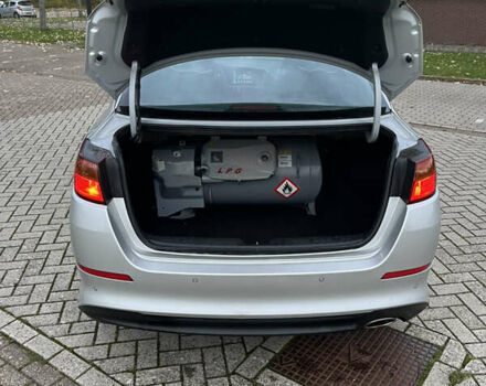 Серый Киа K5, объемом двигателя 2 л и пробегом 245 тыс. км за 9100 $, фото 2 на Automoto.ua