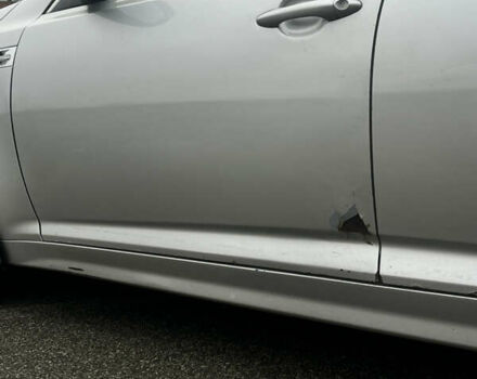 Серый Киа K5, объемом двигателя 2 л и пробегом 246 тыс. км за 7600 $, фото 10 на Automoto.ua