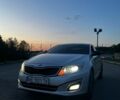 Сірий Кіа K5, об'ємом двигуна 2 л та пробігом 203 тис. км за 10500 $, фото 1 на Automoto.ua