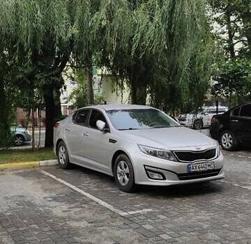 Серый Киа K5, объемом двигателя 2 л и пробегом 222 тыс. км за 10900 $, фото 9 на Automoto.ua