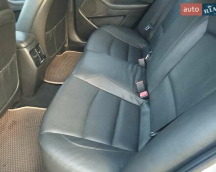 Серый Киа K5, объемом двигателя 2 л и пробегом 207 тыс. км за 10200 $, фото 4 на Automoto.ua