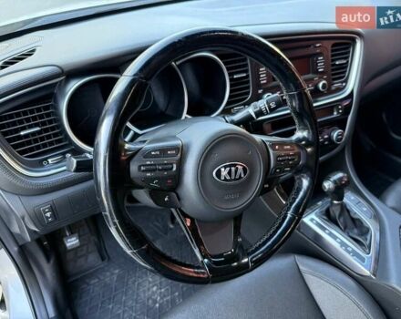 Серый Киа K5, объемом двигателя 2 л и пробегом 248 тыс. км за 9200 $, фото 6 на Automoto.ua
