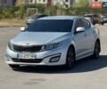 Серый Киа K5, объемом двигателя 2 л и пробегом 320 тыс. км за 8998 $, фото 1 на Automoto.ua
