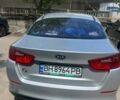 Серый Киа K5, объемом двигателя 2 л и пробегом 358 тыс. км за 7000 $, фото 1 на Automoto.ua