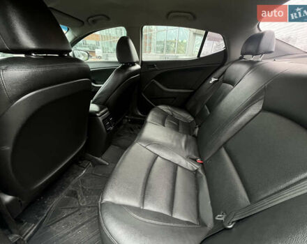 Серый Киа K5, объемом двигателя 2 л и пробегом 246 тыс. км за 7600 $, фото 20 на Automoto.ua