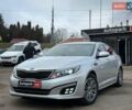 Серый Киа K5, объемом двигателя 2 л и пробегом 205 тыс. км за 10490 $, фото 1 на Automoto.ua