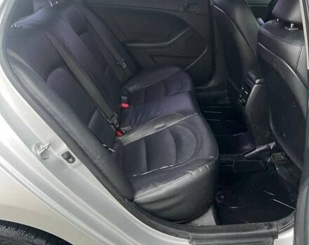 Серый Киа K5, объемом двигателя 2 л и пробегом 230 тыс. км за 8700 $, фото 5 на Automoto.ua