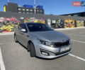 Серый Киа K5, объемом двигателя 2 л и пробегом 172 тыс. км за 8000 $, фото 1 на Automoto.ua