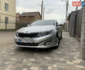 Серый Киа K5, объемом двигателя 2 л и пробегом 240 тыс. км за 10400 $, фото 2 на Automoto.ua