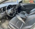 Серый Киа K5, объемом двигателя 2 л и пробегом 238 тыс. км за 10800 $, фото 6 на Automoto.ua