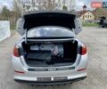Серый Киа K5, объемом двигателя 2 л и пробегом 115 тыс. км за 10300 $, фото 14 на Automoto.ua