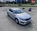Серый Киа K5, объемом двигателя 2 л и пробегом 115 тыс. км за 10300 $, фото 1 на Automoto.ua