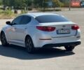 Серый Киа K5, объемом двигателя 2 л и пробегом 320 тыс. км за 8998 $, фото 3 на Automoto.ua