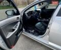 Серый Киа K5, объемом двигателя 2 л и пробегом 115 тыс. км за 10300 $, фото 16 на Automoto.ua