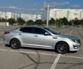 Серый Киа K5, объемом двигателя 2 л и пробегом 340 тыс. км за 8199 $, фото 1 на Automoto.ua